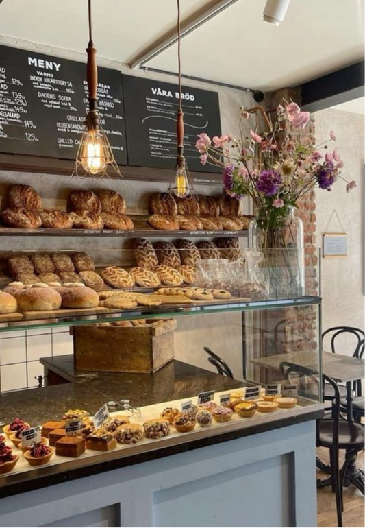 Artisan Bakery Display with Fresh Pastries Greeting Card